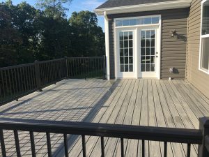 Island Mist decking with Black Azek Impression Express rail