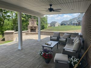 Underdeck patio and wood burning fireplace