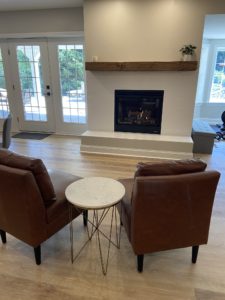 Copy of Gas fireplace with white subway tile surround and raised hearth